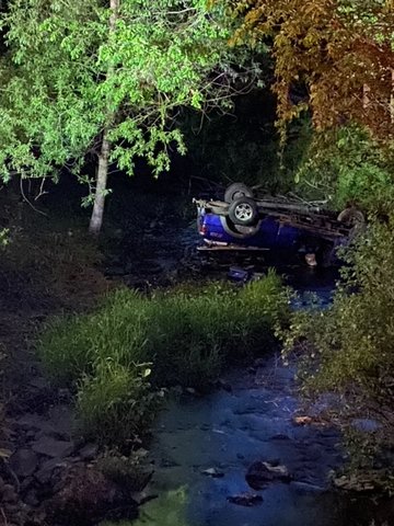 At approximately 7:30 p.m. on May 20,  a blue Ford pickup truck, traveled down Erie Ave, crossed lower Main Street,into the Tinway Apartment parking lot before flipping into the runoff stream of Little Lake Erie.